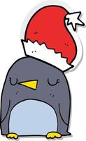 adesivo de um pinguim de natal fofo vetor