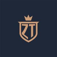 zt logotipo inicial do monograma com estilo de escudo e coroa vetor