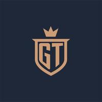 logotipo inicial do monograma gt com estilo de escudo e coroa vetor