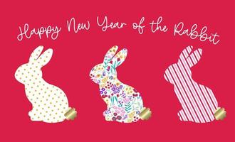 silhueta de coelho floral. texto escrito 'feliz ano novo do coelho' vetor