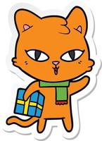 adesivo de um gato de desenho animado com um presente vetor