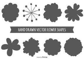 Formas de flores desenhadas à mão vetor