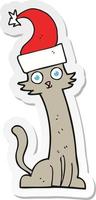 adesivo de um gato de desenho animado com chapéu de natal vetor