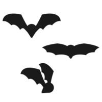 silhuetas de morcegos voando vetor