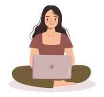 mulher feliz sentada com um laptop, pernas cruzadas vetor