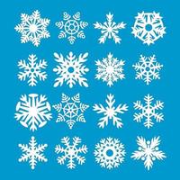 conjunto de ícone de flocos de neve de vetor sobre fundo azul