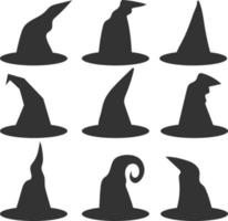 silhuetas cinzentas de chapéus de bruxa de halloween vetor