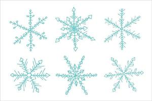 conjunto de flocos de neve desenhados à mão bonito. clipart de doodle de natal e ano novo vetor