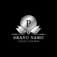 letra p círculo luxuoso e deixa design de logotipo de vetor de crista simples para marca vintage natural