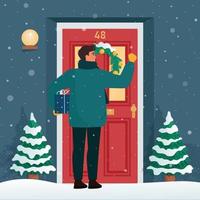 homem com um presente bate na porta. Natal ou véspera de ano novo, tempo nevado. ilustração vetorial fofa em estilo simples vetor