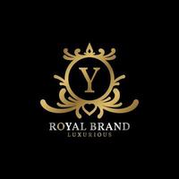 letra y design de logotipo de vetor de crista real para marca luxuosa