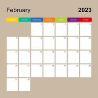 página do calendário para fevereiro de 2023, planejador de parede com design colorido. semana começa na segunda-feira. vetor