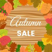 folhas de outono em uma mesa de madeira e a venda de outono de inscrição. ilustração vetorial vetor