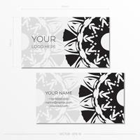modelo para cartões de visita de design de impressão em branco com padrões pretos. preparando um cartão de visita com um lugar para seu texto e um ornamento abstrato. vetor