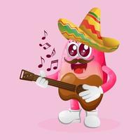 lindo monstro rosa com chapéu mexicano tocando guitarra vetor