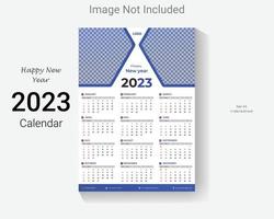 Modelo de design de calendário de parede de ano novo de 2023. layout de calendário de ano novo fácil e editável de uma página. vetor