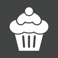 ícone invertido de glifo de cupcake vetor