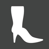 ícone invertido de glifo de botas longas vetor