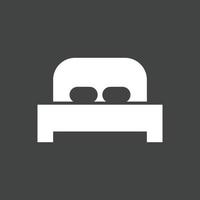 ícone invertido de glifo de cama vetor