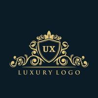 logotipo da letra ux com escudo de ouro de luxo. modelo de vetor de logotipo de elegância.
