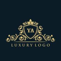 logotipo da letra ya com escudo de ouro de luxo. modelo de vetor de logotipo de elegância.