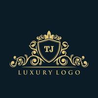logotipo da letra tj com escudo de ouro de luxo. modelo de vetor de logotipo de elegância.