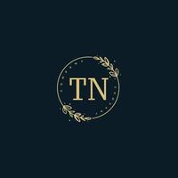 monograma de beleza tn inicial e design de logotipo elegante, logotipo de caligrafia da assinatura inicial, casamento, moda, floral e botânico com modelo criativo. vetor