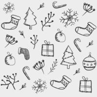 elementos de natal desenhados à mão com meias doces caixa de presente de bola de árvore e galho de folha vetor
