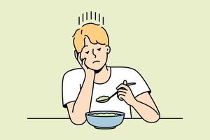 cara sem apetite olha para sopa magra ou salada feita de legumes. homem segue dieta prescrita pelo médico. menino, infelizmente, comendo prato vegetariano. ilustração isolada colorida da linha de contorno do vetor. vetor