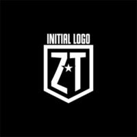 logotipo de jogo inicial zt com escudo e design de estilo estrela vetor