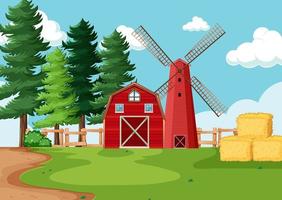celeiro vermelho e moinho de vento em cenário de fazenda