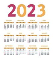 calendário 2023. modelo de calendário anual 2023. a semana começa no domingo. calendário nas cores azuis, vermelhas e amarelas sobre fundo branco. vetor