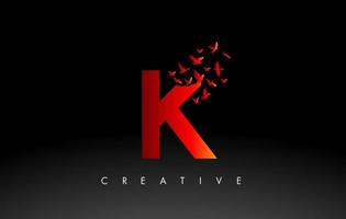 letra vermelha do logotipo k com bando de pássaros voando e se desintegrando da carta. vetor