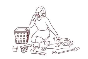 jovem mãe limpando quarto de crianças falando no celular. mãe arruma as roupas dos filhos no chão falando no telefone. ilustração vetorial. vetor