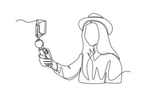 uma jovem mulher desenhando uma única linha grava vídeo ao vivo no gadget de smartphone moderno. conceito de vlog. ilustração em vetor gráfico de desenho de desenho de linha contínua.