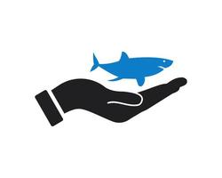 design de logotipo de tubarão de mão. logotipo do golfinho com vetor de conceito de mão. design de logotipo de mão e tubarão