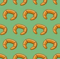 fundo de vetor sem costura verde menta com bagels doces