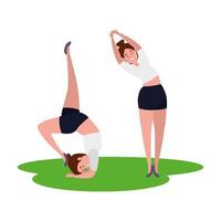 belo casal de garotas praticando pilates na grama