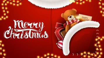 Feliz Natal, postal vermelho em forma de fantasia de Papai Noel com presente e ursinho de pelúcia no bolso vetor