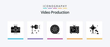 pacote de ícones de glifo 5 de produção de vídeo, incluindo tv. antena tv. Holofote. carretel vintage. rolo de filme. design de ícones criativos vetor