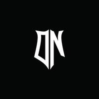 Fita de logotipo de letra de monograma dn com estilo de escudo isolado em fundo preto vetor