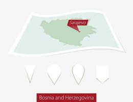 curvado papel mapa do Bósnia e herzegovina com capital Sarajevo em cinzento fundo. quatro diferente mapa PIN definir. vetor