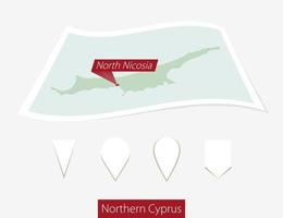 curvado papel mapa do norte norte Nicósia com capital tbilisi em cinzento fundo. quatro diferente mapa PIN definir. vetor