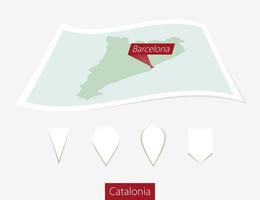 curvado papel mapa do Catalunha com capital Barcelona em cinzento fundo. quatro diferente mapa PIN definir. vetor