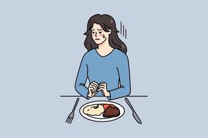 infeliz jovem mulher sentar às mesa com Comida luta com comendo transtorno. chateado menina recusar a partir de refeição Sofra a partir de anorexia ou bulimia. cuidados de saúde e psicológico ajuda. vetor ilustração.