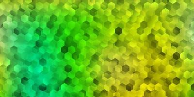 layout de vetor verde e amarelo claro com formas de hexágonos.