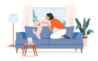 animal proprietário. uma mulher é jogando com uma cachorro em a sofá. relaxante com uma animal. plano vetor ilustração.