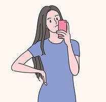 uma mulher está olhando para o celular. mão desenhada estilo ilustrações vetoriais. vetor