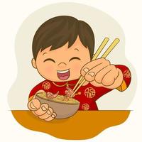 menino em traje chinês comendo uma tigela de macarrão ramen