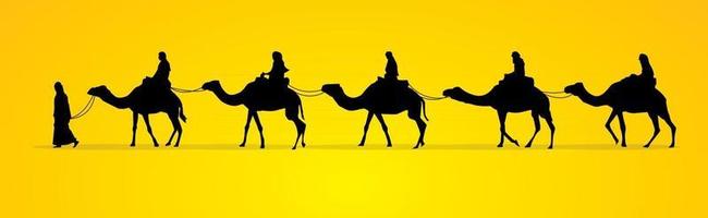 cameleiro com caravana de camelos